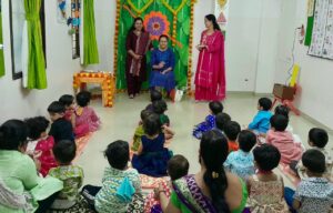 r Anagha Kanade Deshpande teaching oral hygiene to children at Aajol preschool Kothrud Pune